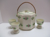 Antique Biscuit Jar and Three Matching Egg Coddlers