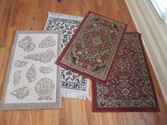 4 Small Rugs