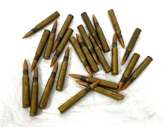 23 Rounds of .30-06 SPRG. Orange Ammo