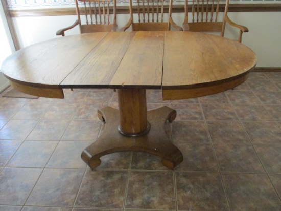 Oak Pedestal Table With 2 Leaves