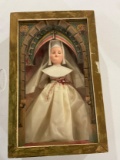 VINTAGE NUN DOLL IN DECORATIVE WOOD BOX