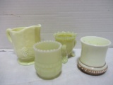 Four Pieces of Custard Uranium Glass Cups and Creamer