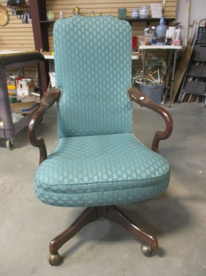 Wood and Nailhead Trim Upholstered Rolling Arm Chair