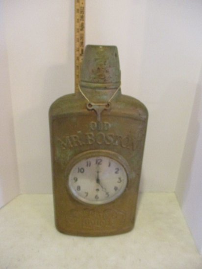 Gilbert "Old Mr. Boston Fine Liquors" Cast Aluminum Bottle Shaped 8 Day Clock
