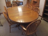 Oak Double Pedestal Claw Foot Trestle Table, Three Leaves, Two Armchairs and Six Side Chairs