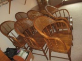 Six Oak Bent Arm Caned Back Chairs