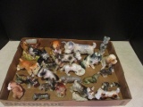 Grouping of Porcelain Dog Figurines and Match Holder