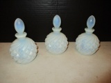 Three Opalescent Stoppered Bottles