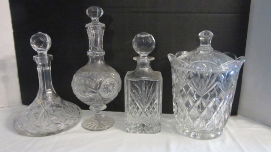Three Crystal Decanters and Ice Bucket