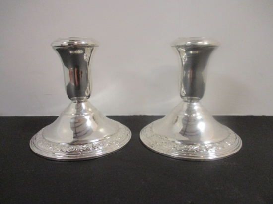 Pair of AMC Weighted Sterling Candleholders