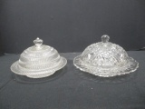 Two Clear Glass Butter Dishes