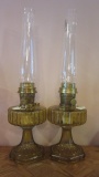 Two Aladdin Amber Corinthian Model B Burner Oil Lamps with Aladdin Lox-On Chimneys