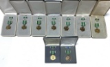 (9) Cased Military Merit Award Medals and (1) Named