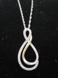 Sterling Silver and 10k Gold Pendant on 18