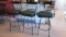 Three Black Timmerman, Inc. Swiveling Bar Chairs with Padded Vinyl Seats