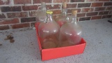 Four Old Glass Gallon Jugs