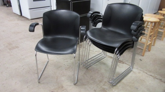 Five Harter a Jami Co. Black and Chrome Stacking Armchairs
