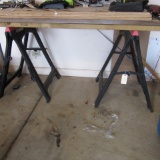 Pair of Central Machinery Foldable Sawhorses and Slat Board Top