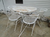 White Wrought Iron Table with Four Chairs