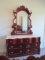 Pulaski Carved Serpentine Dresser with Cultured Marble Top and Beveled Stand Mirror