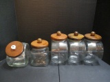 Five Glass Cannisters with Wooden Lids