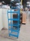Blue Wire Store Display Rack with Locking Back Casters and Sign Holder Header