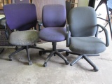 Three Rolling Office Chairs
