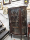 Antique Curved Side Tiger Oak Curio w/ Carved Lion Heads