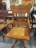 Antique Carved Wood & Cane Seat Swivel Captains Chair