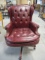 Vintage Red Leather-Like Rolling Executive Desk Chair