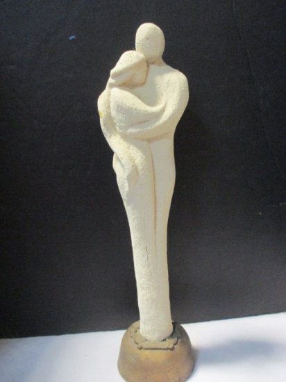 Sculpture Of Couple Embracing.  Cancun on Base.  Some wear.