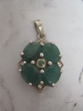 Sterling Silver Flower Pendant with Green Stones