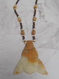 Bead Necklace with Carved Stone Pendant
