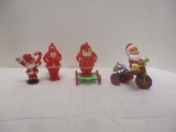 4 Vintage Plastic and Metal Santas