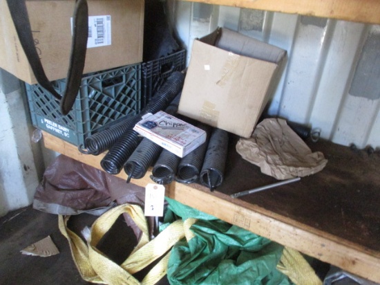 Shelf Lot of Chipper Springs Parts and Floor Lot of Tarps