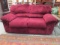 Ashley Furniture Overstuffed Burgundy Love Seat