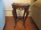Ornately Carved Accent Table with Boreal/Blackstar Granite Top
