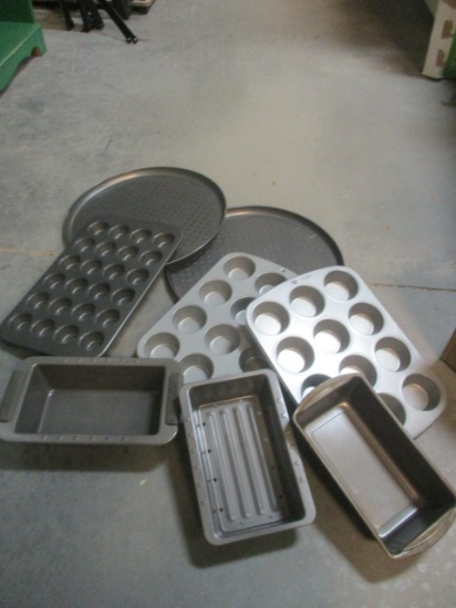 Box of Baking Pans, Bread Pans, Pizza Trays, Muffin Tins.