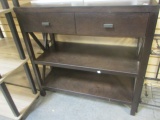 Occasional Table with Two Drawers and Two Shelves.