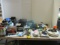 Table Lot of Gardening,  Paint, Oils , Pans, Dishes, Camera, Etc.