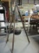 Cast Iron Pot with Lid on Tripod for Cooking.