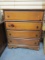 Four Drawer Pine Cabinet. Knob Missing on Drawer. Worn Top.