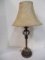 Metal and Gold Toned Lamp with Faux Leather Shade.