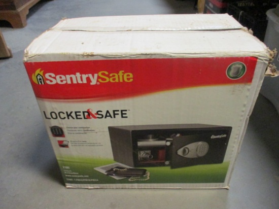 NIB Sentry Safe with Combination Lock. One CU. FT.