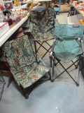 Two Camo and Green Canvas Folding Chairs.