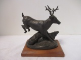 Metal Mule Deer Sculpture on Wood Base.