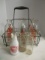 Vintage Metal 6-Bottle Carrier with 9 Glass Milk Bottles