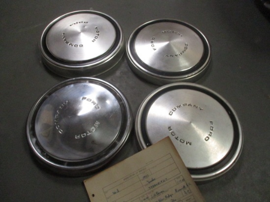 4 Ford Motor Company Hub Caps and Ford Sales Receipt Booklet