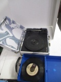 Crosley Suitcase Record Player and Collection of 33 Records