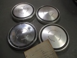 4 Ford Motor Company Hub Caps and Ford Sales Receipt Booklet